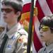 Eleven-year-old Brendan Howard, Troop 27, holds the American Flag as he watches the Arborcrest Memorial Day Observance on Sunday, May 26. Daniel Brenner I AnnArbor.com